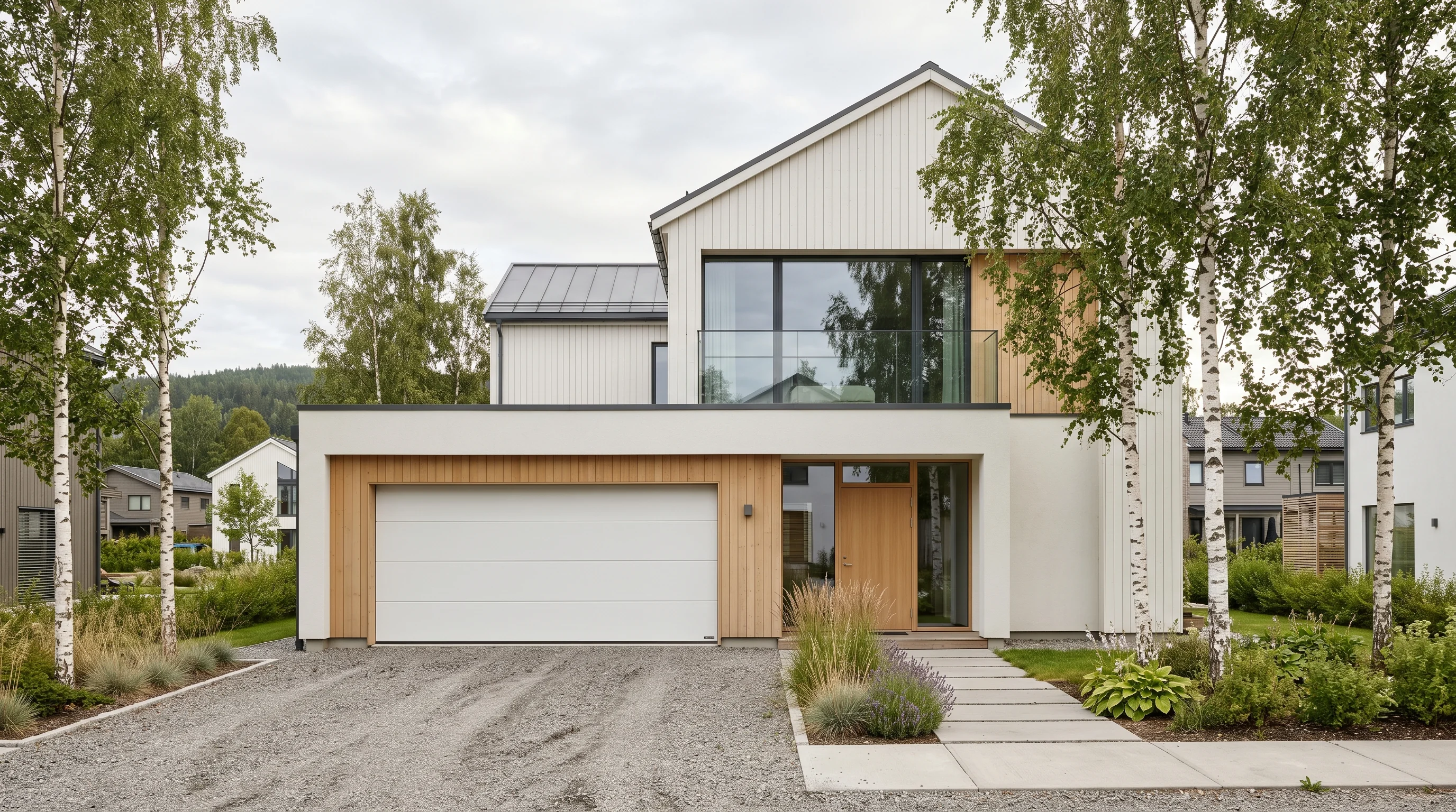 Porte sectionnelle blanche sur maison scandinave contemporaine