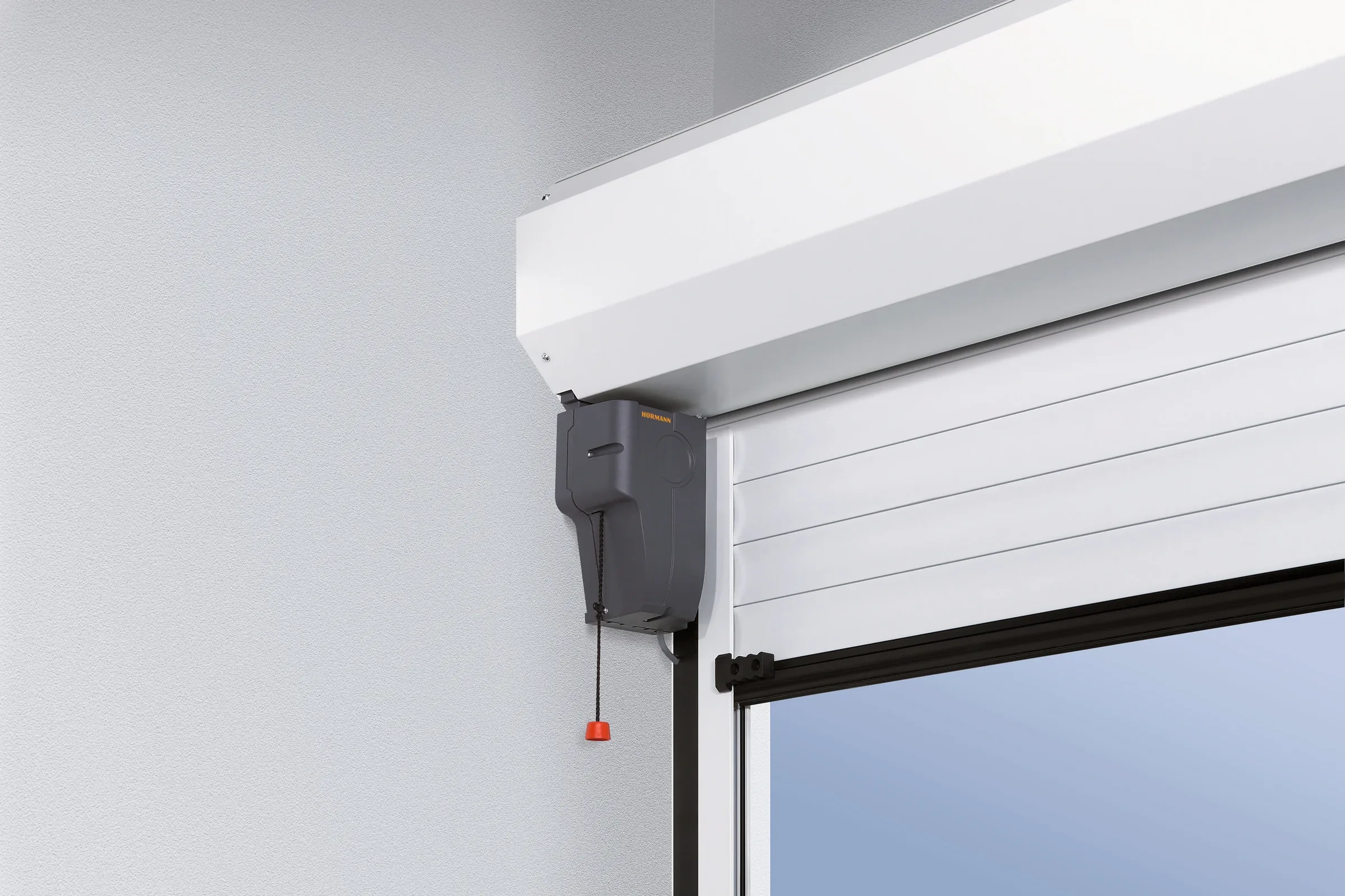 Coffre d'enroulement RollMatic sous le linteau