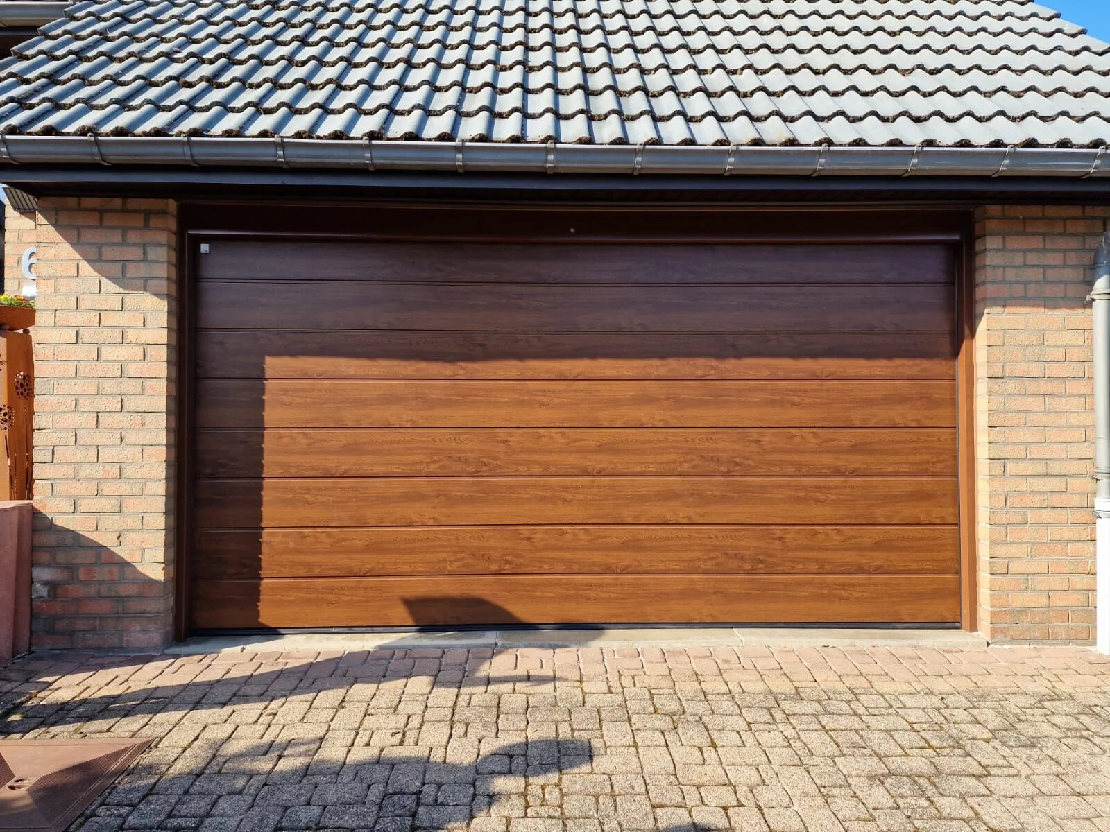 Sectionnelle décor bois Hörmann Decograin à Schuttrange